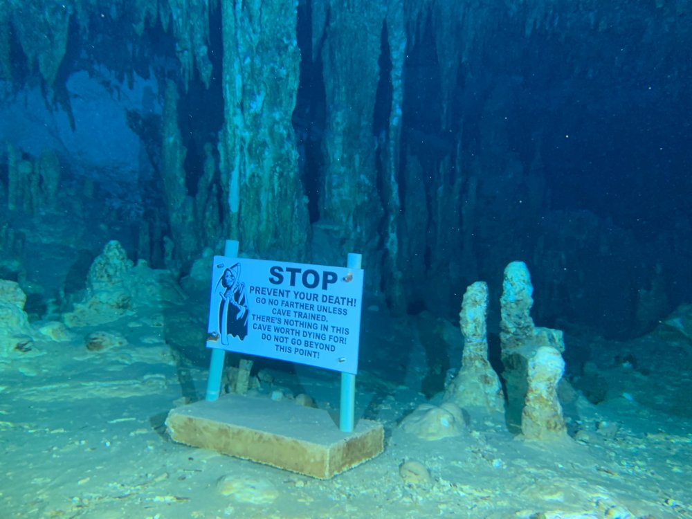 A Warning Sign in Underwater Cave