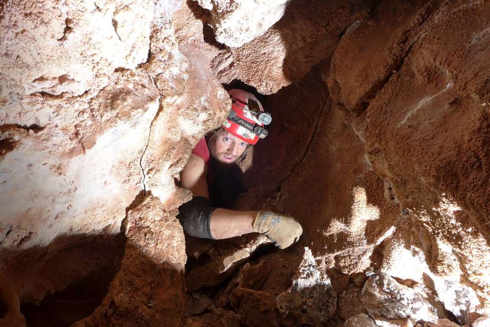 Caver in a Tight Squeeze